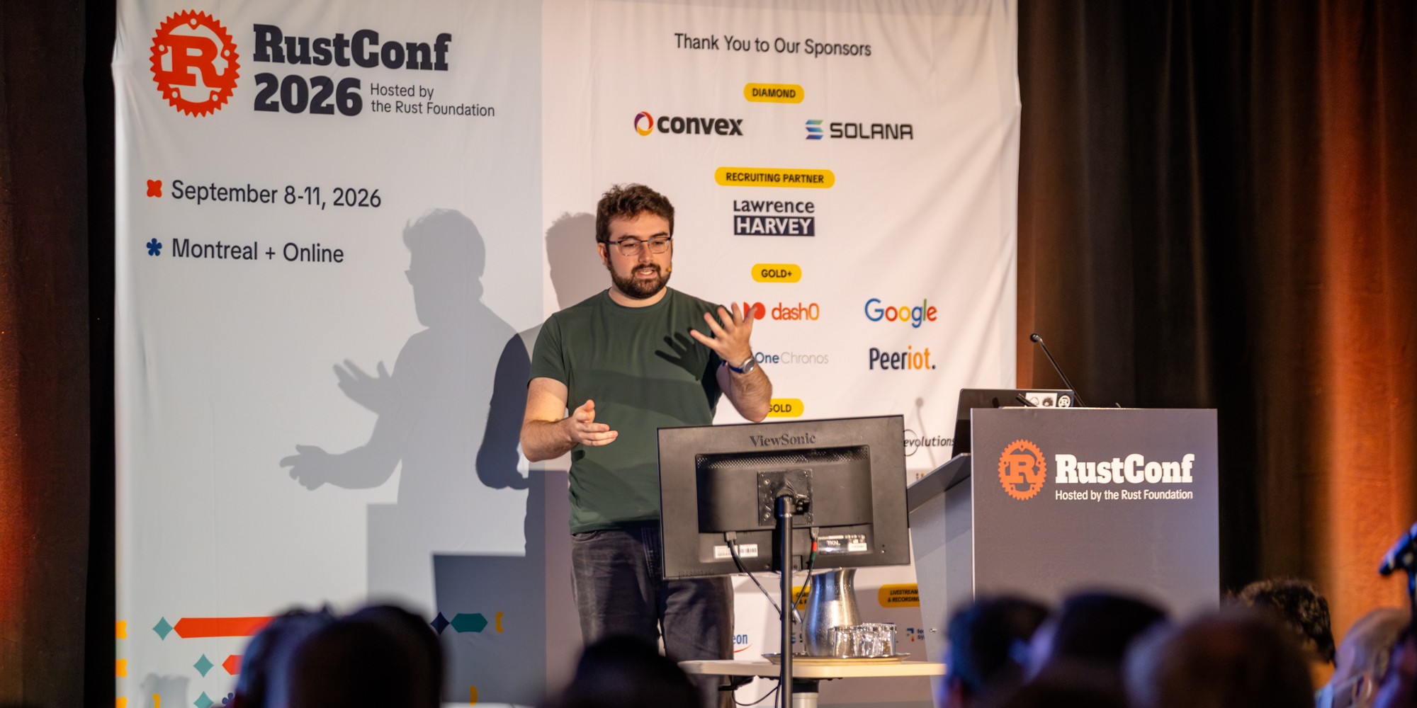 Sept 9th 2026 - A picture of me presenting at RustConf 2026 in Montreal